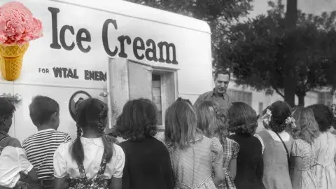 Children listening to a man at an Arden Ice Cream truck.