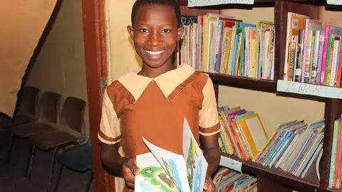 Girl in a library in Africa