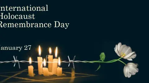 barbed wire turning into flowers with 6 candles burning