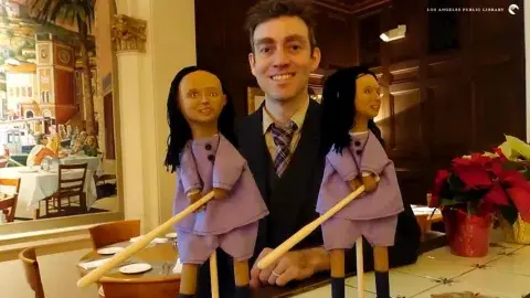 Jesse Kingsley with two puppets