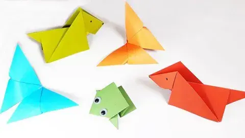 Colored paper that's been folded into various animals are on display.