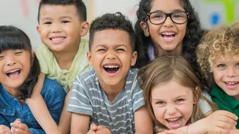 Six children laughing