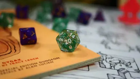 green 20-sided dice 