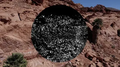 textured circle superimposed on top a desert landscape