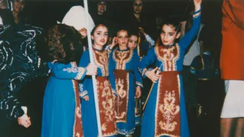 group of children wearing traditional Armenian folk costumes 