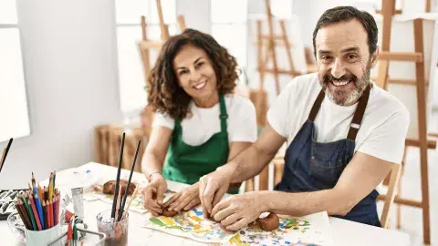 Adults working on crafts