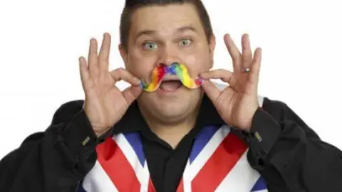 Billy Bonkers with a silly rainbow mustache