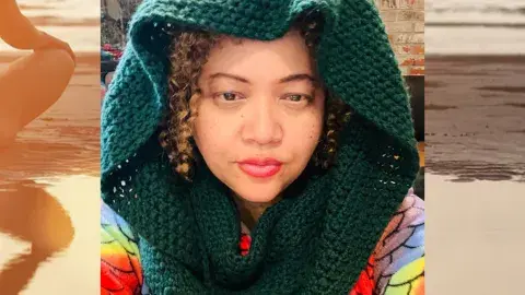 Dorothy Pincus in a green knitted scarf