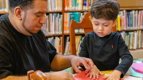 Father and Son crafting together
