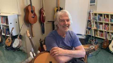 craig with his guitar