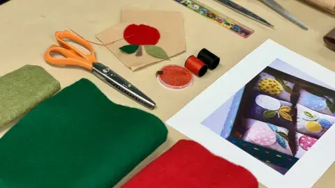 Felt sewing supplies on table