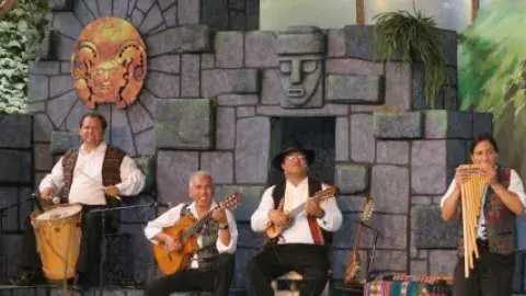A group of four musicians playing music