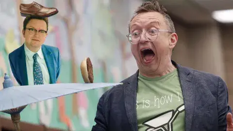 Michael Rayner juggles a cheeseburger on a parasol