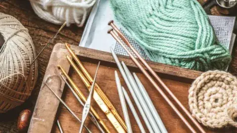 Knitting needles and yarn