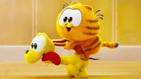 Baby Garfield riding the dog Odie like a pony. 