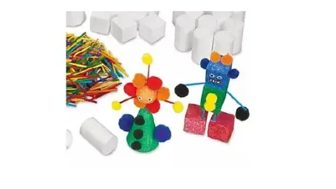 Craft using foam blocks and pom poms