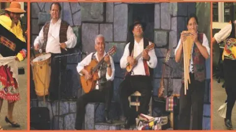 musicians and dancers in colorful dress
