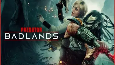 A woman and an alien in combat