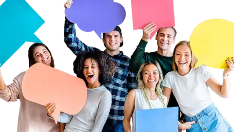 several teens hold up colored speech bubbles