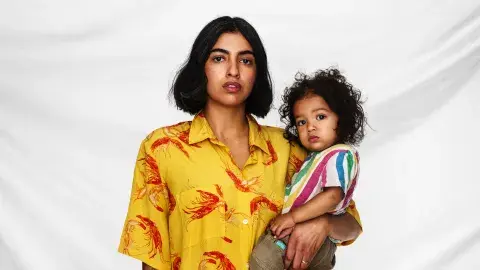 person holding child