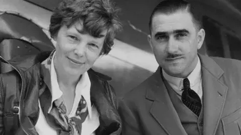 Amelia Earhart and her technical expert, Paul Mantz.