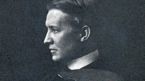 Side view of Bertram Grosvenor Goodhue.