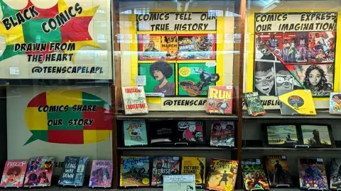 A comic book display at a library.
