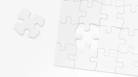 Blank white jigsaw puzzle pieces