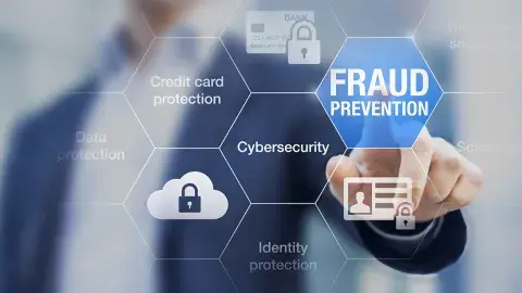  man pointing to fraud prevention wording with other identity theft words around