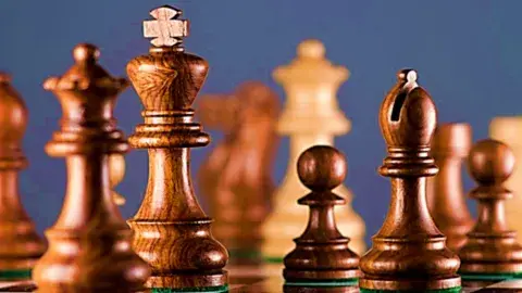 Chess pieces on the chessboard