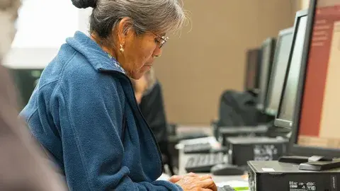 Senior woman using a computer
