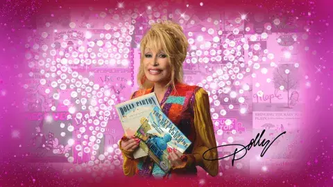 Dolly Parton against a pink sparkly backdrop