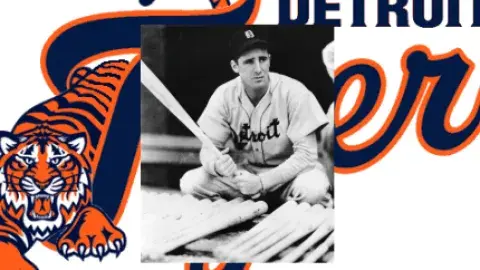 Hank Greenberg in front of Detroit Tigers logo.