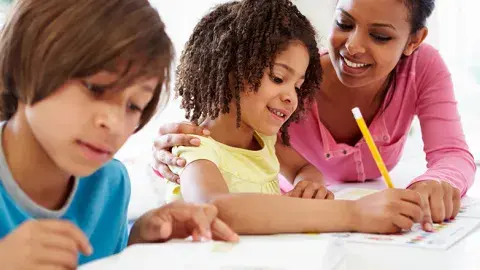 Tutor helping child