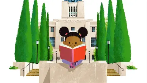 A child reads a book in the garden with the Central Library behind them.