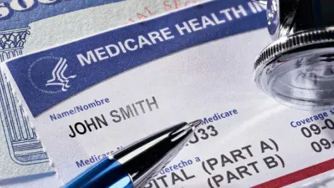 Medicare card with pen