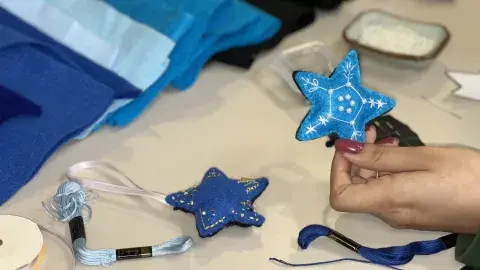 Handmade blue felt star ornaments