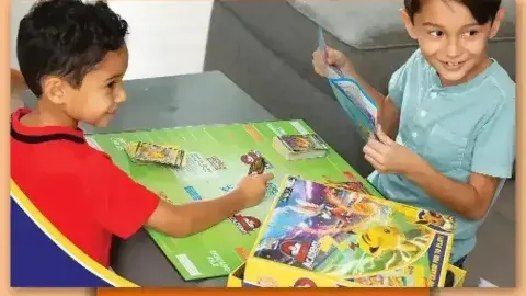 Children playing Pokemon Battle Academy