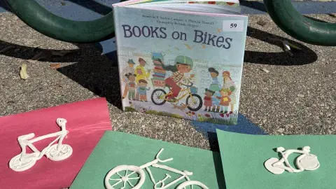 The book "Books on Bikes" and then three bikes made of clay.