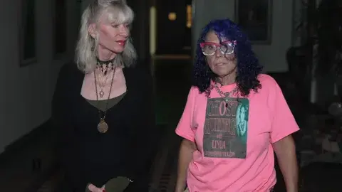 Patty and Linda on a ghost hunt in Central Library