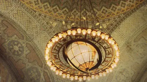 rotunda of library featuring globe chandelier