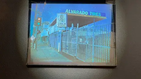 framed photograph of tire shop