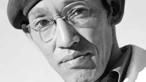 portrait of man wearing beret