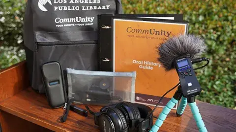 CommUnity backpack with various recording equipment