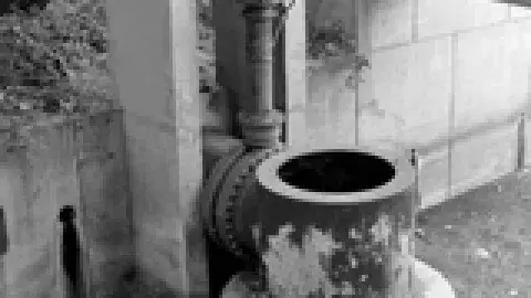 b & w photo of a bldg under construction