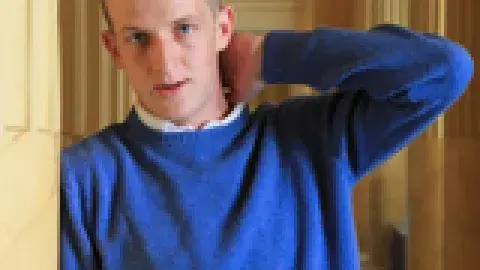 Edouard Louis in a blue sweater