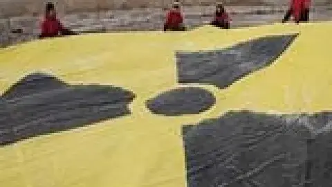giant parachute with a black and yellow radio-active logo on it